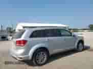 2014 Dodge Journey SXT with VIN 3C4PDCBG2ET229756, listed as a Copart auction lot 71250305 with 171,998 mi miles and Salvage title. Bid and sale history available at DreamBid. Image 3.