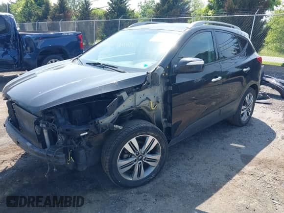 2014 Hyundai Tucson Limited z VIN KM8JU3AG6EU848806, wystawiony jako IAAI lot #42559431 z przebiegiem 176 992 mil mil oraz . Historia ofert i sprzedaży dostępna na DreamBid. Obrazek 2.