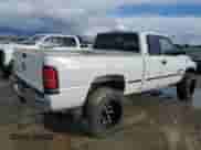 1999 Dodge 2500 with VIN 1B7KF23Z0XJ575779, listed as a Copart auction lot 49535585 with 185,237 mi miles and Clean title. Bid and sale history available at DreamBid. Image 3.