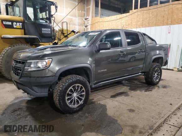 2018 Chevrolet Colorado 4WD ZR2 z VIN 1GCGTEEN0J1176761, wystawiony jako Copart lot #85403655 z przebiegiem 49 017 mil mil oraz Czysty tytuł • Clean title. Historia ofert i sprzedaży dostępna na DreamBid. Obrazek 1.
