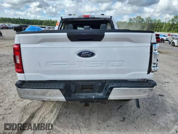 2021 Ford F-150 XL z VIN 1FTFW1E51MKD60763, wystawiony jako Copart lot #64782155 z przebiegiem Nie podano mil oraz Szkoda całkowita • Salvage title. Historia ofert i sprzedaży dostępna na DreamBid. Obrazek 6.