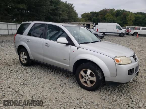 2007 Saturn VUE I4 Hybrid with VIN 5GZCZ33Z97S871233, listed as a Copart auction lot 72376134 with 99,179 mi miles and Salvage title. Bid and sale history available at DreamBid. Image 4.