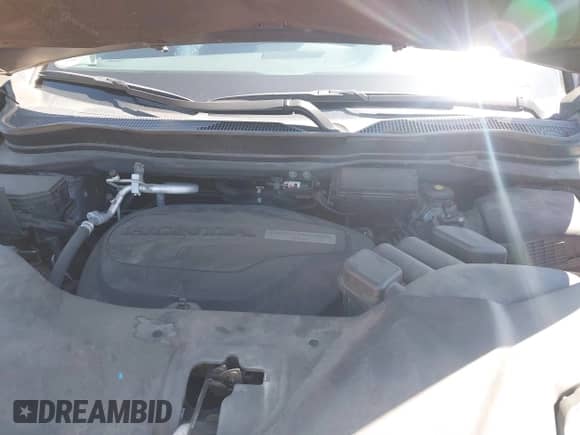 2020 Honda Pilot Touring 7-Passenger z VIN 5FNYF5H69LB015626, wystawiony jako IAAI lot #42319992 z przebiegiem 134 084 mil mil oraz . Historia ofert i sprzedaży dostępna na DreamBid. Obrazek 10.