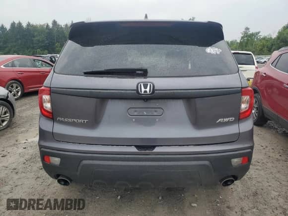2019 Honda Passport EX-L with VIN 5FNYF8H54KB019980, listed as a Copart auction lot 67197835 with 132,659 mi miles and Salvage title. Bid and sale history available at DreamBid. Image 6.