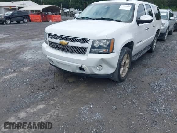 2007 Chevrolet Suburban LT z VIN 3GNFC16037G224925, wystawiony jako IAAI lot #43402241 z przebiegiem 207 763 mil mil oraz . Historia ofert i sprzedaży dostępna na DreamBid. Obrazek 6.