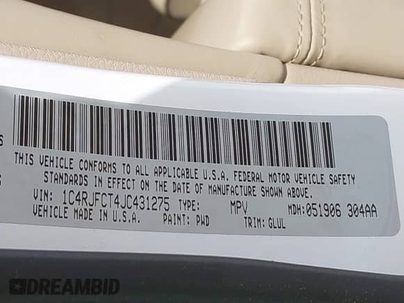 2018 Jeep Grand Cherokee Overland with VIN 1C4RJFCT4JC431275, listed as a IAAI auction lot 41931665 with 99,097 mi miles and . Bid and sale history available at DreamBid. Image 9.