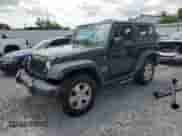 2010 Jeep Wrangler Islander z VIN 1J4AA2D16AL171507, wystawiony jako Copart lot #61957905 z przebiegiem 132 462 mil mil oraz Czysty tytuł • Clean title. Historia ofert i sprzedaży dostępna na DreamBid. Obrazek 1.