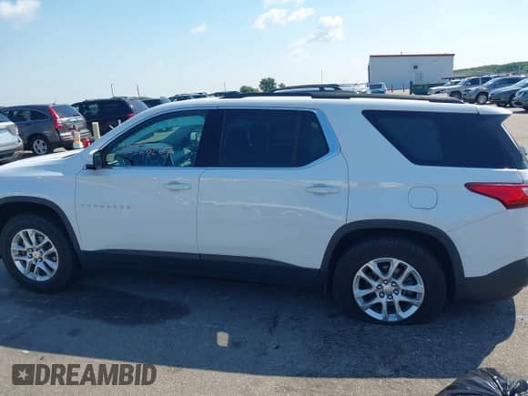 2019 Chevrolet Traverse LT Cloth with VIN 1GNEVGKW0KJ118037, listed as a IAAI auction lot 42976267 with 68,719 mi miles and . Bid and sale history available at DreamBid. Image 14.