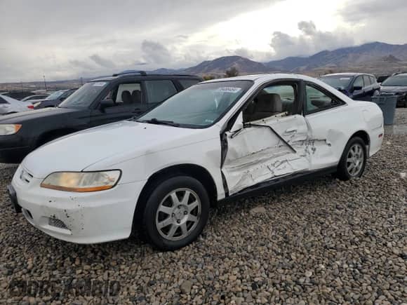2002 Honda Accord with VIN 1HGCG32222A006616, listed as a Copart auction lot 76488464 with 184,143 mi miles and Salvage title. Bid and sale history available at DreamBid. Image 1.