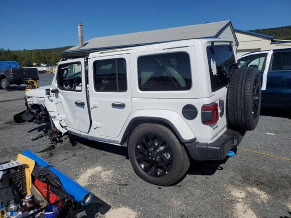 2024 Jeep Wrangler Sahara with VIN 1C4RJXP69RW276890, listed as a Copart auction lot 81291715 with 31,296 mi miles and Salvage title. Bid and sale history available at DreamBid. Image 2.