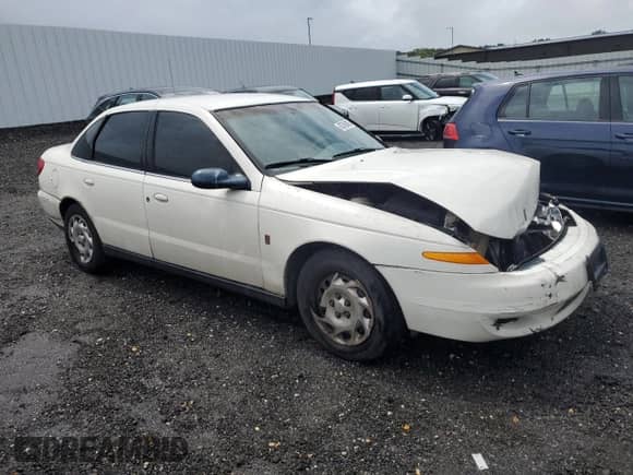 2002 Saturn LS с VIN 1G8JU54F52Y506149, выставлен на аукционе Copart как лот 63762405 с пробегом Не указан миль и Списание • Salvage title. История ставок и продаж доступна на DreamBid. Изображение 4.