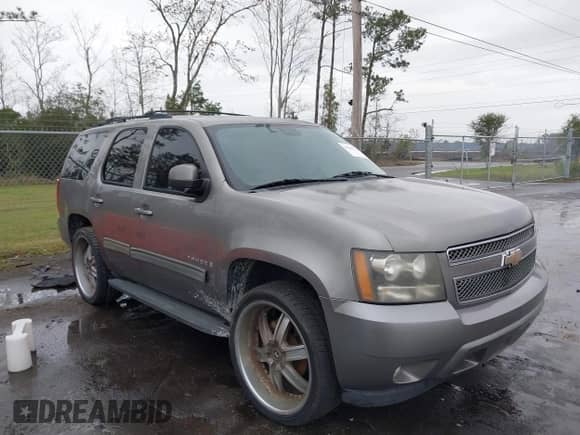 2009 Chevrolet Tahoe 1LT z VIN 1GNEC23359R235413, wystawiony jako IAAI lot #41661328 z przebiegiem 207 225 mil mil oraz . Historia ofert i sprzedaży dostępna na DreamBid. Obrazek 1.