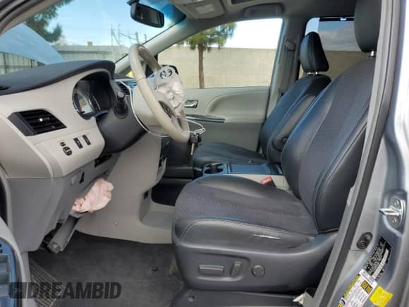 2014 Toyota Sienna SE with VIN 5TDXK3DC2ES465091, listed as a Copart auction lot 80740415 with 122,588 mi miles and Salvage title. Bid and sale history available at DreamBid. Image 7.