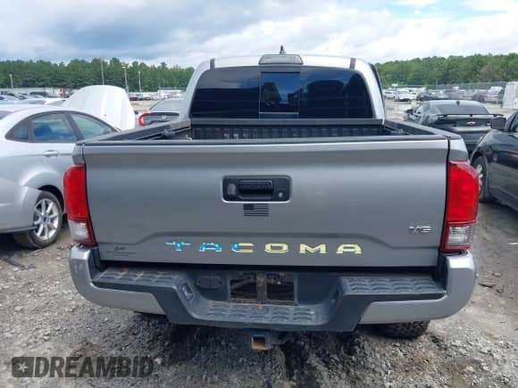2019 Toyota Tacoma SR z VIN 3TMCZ5AN8KM287646, wystawiony jako IAAI lot #42969397 z przebiegiem 100 562 mil mil oraz . Historia ofert i sprzedaży dostępna na DreamBid. Obrazek 16.