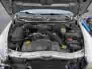 2003 Dodge Dakota Sport z VIN 1D7HG38X43S212335, wystawiony jako Copart lot #85670114 z przebiegiem 161 851 mil mil oraz Szkoda całkowita • Salvage title. Historia ofert i sprzedaży dostępna na DreamBid. Obrazek 12.