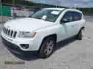 2012 Jeep Compass Sport z VIN 1C4NJDBBXCD608033, wystawiony jako IAAI lot #43069199 z przebiegiem 177 249 mil mil oraz . Historia ofert i sprzedaży dostępna na DreamBid. Obrazek 18.