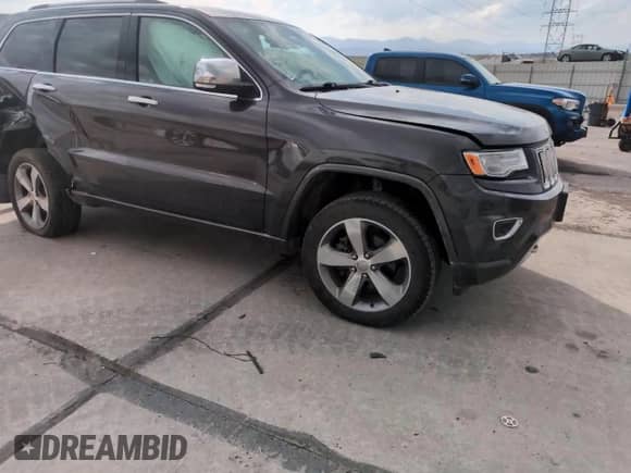 2016 Jeep Grand Cherokee Overland z VIN 1C4RJFCG6GC490047, wystawiony jako Copart lot #54076295 z przebiegiem 57 084 mil mil oraz Szkoda całkowita • Salvage title. Historia ofert i sprzedaży dostępna na DreamBid. Obrazek 14.