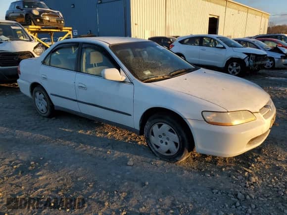 1999 Honda Accord LX with VIN 1HGCG1644XA068753, listed as a Copart auction lot 87135784 with 74,386 mi miles and Clean title. Bid and sale history available at DreamBid. Image 4.
