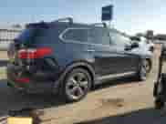 2015 Hyundai Santa Fe Limited z VIN KM8SRDHF6FU125628, wystawiony jako Copart lot #84362155 z przebiegiem 149 050 mil mil oraz Czysty tytuł • Clean title. Historia ofert i sprzedaży dostępna na DreamBid. Obrazek 3.