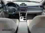 2013 Toyota Camry LE z VIN 4T1BD1FK0DU080437, wystawiony jako Copart lot #71326805 z przebiegiem 214 631 mil mil oraz Szkoda całkowita • Salvage title. Historia ofert i sprzedaży dostępna na DreamBid. Obrazek 8.