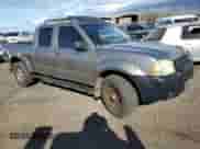 2004 Nissan Frontier XE z VIN 1N6ED29Y74C400170, wystawiony jako Copart lot #62711965 z przebiegiem 147 131 mil mil oraz Szkoda całkowita • Salvage title. Historia ofert i sprzedaży dostępna na DreamBid. Obrazek 4.