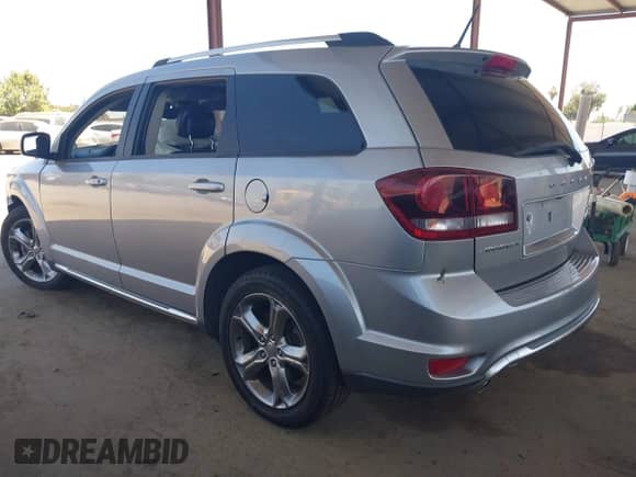 2017 Dodge Journey Crossroad Plus with VIN 3C4PDCGG8HT613733, listed as a IAAI auction lot 42690152 with 97,256 mi miles and . Bid and sale history available at DreamBid. Image 3.