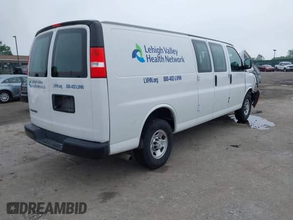 2020 Chevrolet Express Cargo with VIN 1GCWGBFP0L1223210, listed as a IAAI auction lot 42280281 with 20,701 mi miles and . Bid and sale history available at DreamBid. Image 4.