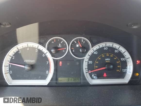 2007 Chevrolet Aveo LT z VIN KL1TG56687B047994, wystawiony jako Copart lot #76341844 z przebiegiem 31 789 mil mil oraz Szkoda całkowita • Salvage title. Historia ofert i sprzedaży dostępna na DreamBid. Obrazek 9.