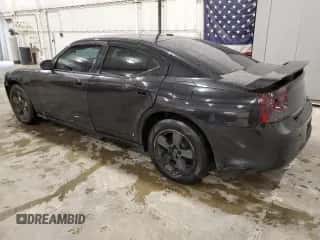 2010 Dodge Charger SXT with VIN 2B3CA3CV4AH210800, listed as a Copart auction lot 90127055 with 154,955 mi miles and Salvage title. Bid and sale history available at DreamBid. Image 2.