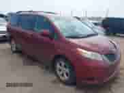 2014 Toyota Sienna LE AAS with VIN 5TDKK3DC2ES491717, listed as a IAAI auction lot 43056857 with 214,762 mi miles and . Bid and sale history available at DreamBid. Image 1.