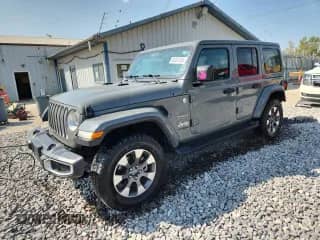 2022 Jeep Wrangler Unlimited Sahara с VIN 1C4HJXENXNW119868, выставлен на аукционе Copart как лот 80207235 с пробегом 65 916 миль миль и Списание • Salvage title. История ставок и продаж доступна на DreamBid. Изображение 1.