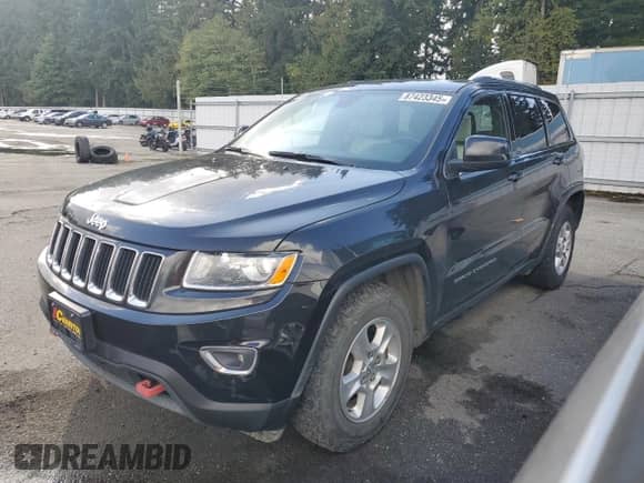 2016 Jeep Grand Cherokee 75th Anniversary with VIN 1C4RJEAG2GC392632, listed as a Copart auction lot 87423345 with 212,711 mi miles and Clean title. Bid and sale history available at DreamBid. Image 1.