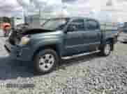 2010 Toyota Tacoma PreRunner z VIN 5TEJU4GN7AZ708023, wystawiony jako Copart lot #84866105 z przebiegiem 195 283 mil mil oraz Szkoda całkowita • Salvage title. Historia ofert i sprzedaży dostępna na DreamBid. Obrazek 1.