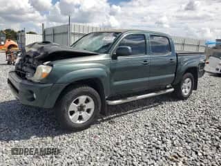 2010 Toyota Tacoma PreRunner z VIN 5TEJU4GN7AZ708023, wystawiony jako Copart lot #84866105 z przebiegiem 195 283 mil mil oraz Szkoda całkowita • Salvage title. Historia ofert i sprzedaży dostępna na DreamBid. Obrazek 1.