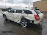 2005 Dodge Magnum SE with VIN 2D4FV48T85H669043, listed as a Copart auction lot 69935015 with 209,181 mi miles and Salvage title. Bid and sale history available at DreamBid. Image 2.
