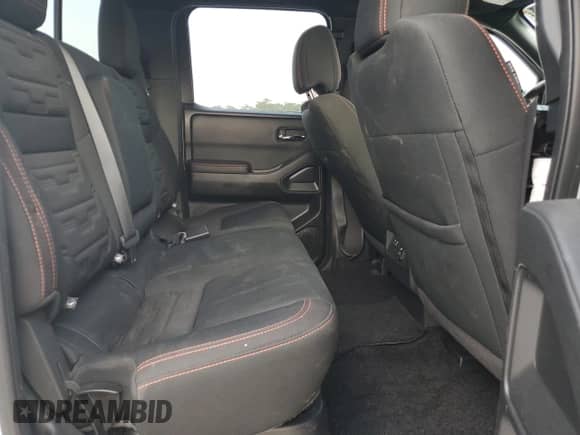 2023 Nissan Frontier Pro-X with VIN 1N6ED1EJ6PN661933, listed as a Copart auction lot 52496135 with 28,533 mi miles and Salvage title. Bid and sale history available at DreamBid. Image 11.