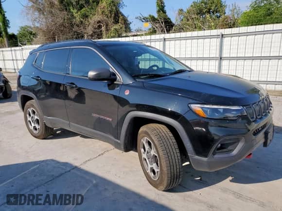 2022 Jeep Compass Trailhawk с VIN 3C4NJDDB4NT175674, выставлен на аукционе Copart как лот 84226745 с пробегом 84 923 миль миль и Списание • Salvage title. История ставок и продаж доступна на DreamBid. Изображение 4.