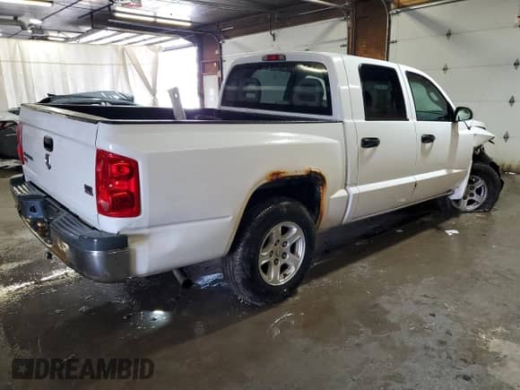 2006 Dodge Dakota SLT z VIN 1D7HE48N86S605611, wystawiony jako Copart lot #84433645 z przebiegiem 135 404 mil mil oraz Szkoda całkowita • Salvage title. Historia ofert i sprzedaży dostępna na DreamBid. Obrazek 3.