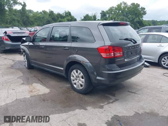 2014 Dodge Journey American Value with VIN 3C4PDCAB3ET285663, listed as a IAAI auction lot 42894235 with 117,285 mi miles and . Bid and sale history available at DreamBid. Image 3.