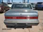 1991 Dodge Dynasty LE with VIN 1B3XC56R9MD115785, listed as a Copart auction lot 48073715 with 64,483 mi miles and Salvage title. Bid and sale history available at DreamBid. Image 6.