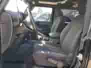 2018 Jeep Wrangler Sport S with VIN 1C4GJWAGXJL811914, listed as a Copart auction lot 65130075 with 88,622 mi miles and Salvage title. Bid and sale history available at DreamBid. Image 7.