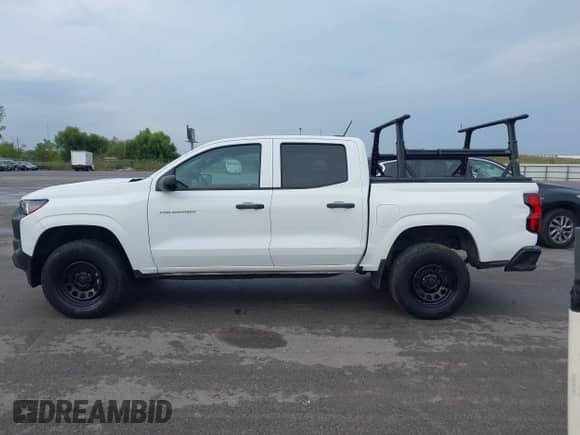 2023 Chevrolet Colorado 2WD Work Truck с VIN 1GCGSBEC5P1154845, выставлен на аукционе IAAI как лот 43539478 с пробегом Не указан миль и . История ставок и продаж доступна на DreamBid. Изображение 14.