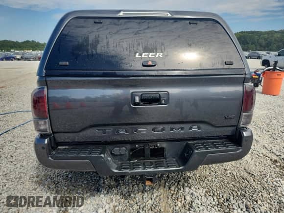 2023 Toyota Tacoma SR с VIN 3TMCZ5AN1PM558196, выставлен на аукционе Copart как лот 70459135 с пробегом 20 863 миль миль и Списание • Salvage title. История ставок и продаж доступна на DreamBid. Изображение 6.