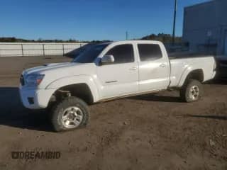 2013 Toyota Tacoma z VIN 3TMMU4FN8DM061180, wystawiony jako Copart lot #86698365 z przebiegiem 160 672 mil mil oraz Szkoda całkowita • Salvage title. Historia ofert i sprzedaży dostępna na DreamBid. Obrazek 1.