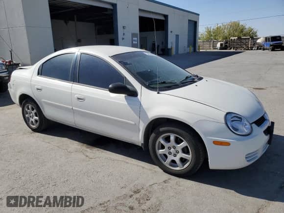 2005 Dodge Neon SXT with VIN 1B3ES56C05D171072, listed as a Copart auction lot 61170435 with 218,495 mi miles and Salvage title. Bid and sale history available at DreamBid. Image 4.