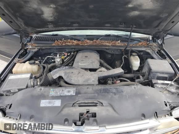 2005 Chevrolet Tahoe LS z VIN 1GNEC13TX5J196143, wystawiony jako Copart lot #81710755 z przebiegiem 238 417 mil mil oraz Szkoda całkowita • Salvage title. Historia ofert i sprzedaży dostępna na DreamBid. Obrazek 12.