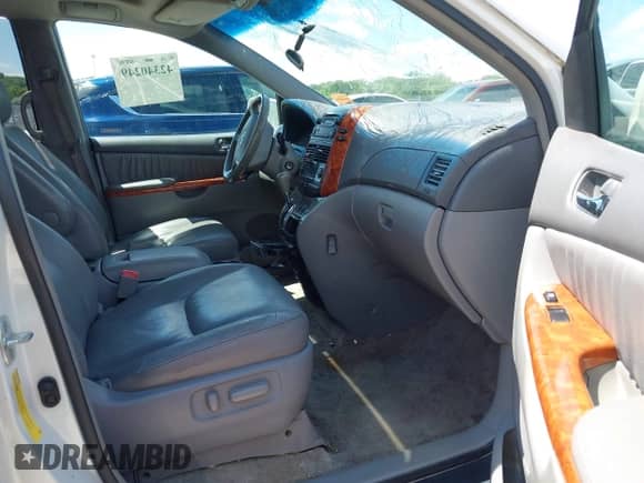 2007 Toyota Sienna XLE z VIN 5TDZK22C87S082670, wystawiony jako IAAI lot #42340249 z przebiegiem 227 064 mil mil oraz . Historia ofert i sprzedaży dostępna na DreamBid. Obrazek 5.