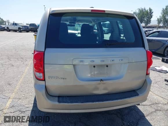 2014 Dodge Grand Caravan SE with VIN 2C4RDGBG2ER316379, listed as a IAAI auction lot 42531072 with 140,095 mi miles and . Bid and sale history available at DreamBid. Image 16.