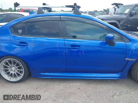 2018 Subaru WRX with VIN JF1VA1A69J9815652, listed as a IAAI auction lot 42153285 with 68,147 mi miles and . Bid and sale history available at DreamBid. Image 13.