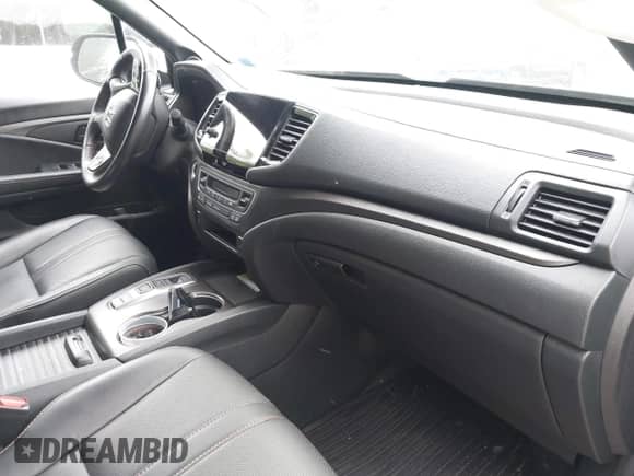 2023 Honda Passport TrailSport z VIN 5FNYF8H66PB024923, wystawiony jako IAAI lot #42243780 z przebiegiem 14 358 mil mil oraz . Historia ofert i sprzedaży dostępna na DreamBid. Obrazek 5.